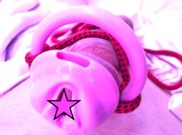A closer peep at pink chastity device...