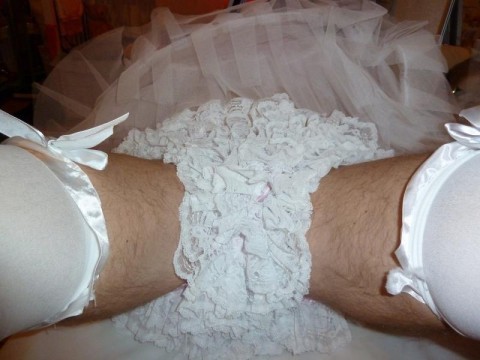 Another pair of all-over-frilly panties with satin topped stockings for good measure!